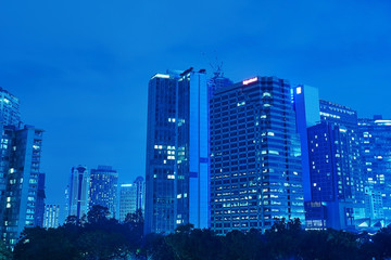 Modern office buildings at night in Kuala Lumpur