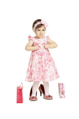 little girl in  dress and big shoes