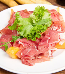 Italian prosciutto with melons