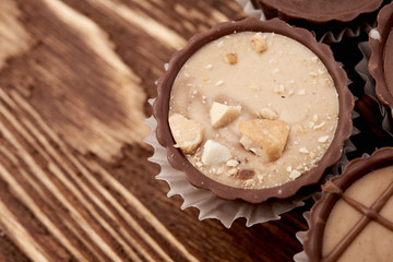Dark chocolate on wooden background
