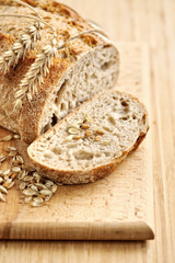 Close-up on traditional bread on wooden board