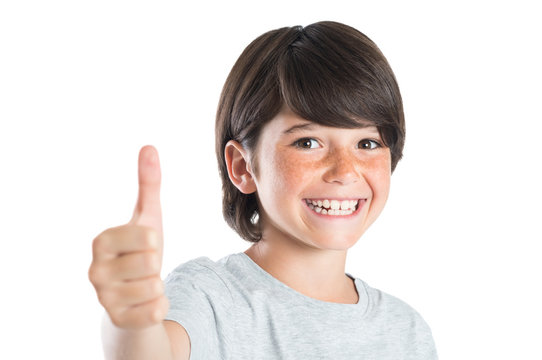 Boy smiling with thumb up