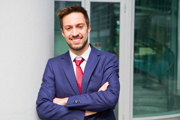 Portrait of an handsome businessman outdoor