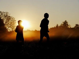 Silhouettes of boys running © flucas