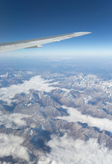   Above the clouds.Wing aircraft in the sky under earth of Tibeth.