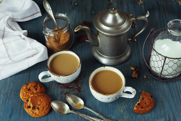 Obraz na płótnie Canvas Coffee with milk and homemade oatmeal cookies