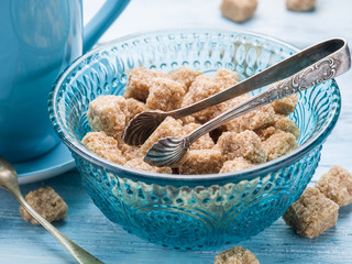 Cane sugar cubes in the old-fashioned glass plate.