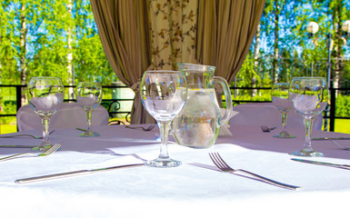 Table with glasses and forks