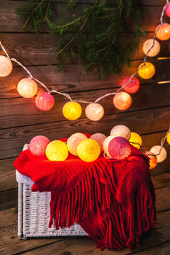 Cotton Christmas garland. Bright multi-colored decoration.