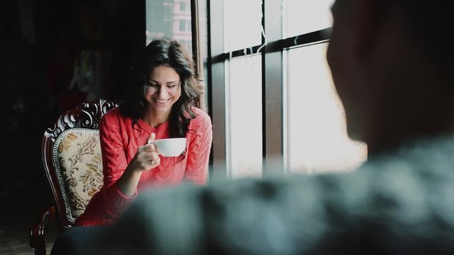 loving couple in a cafe drink coffe