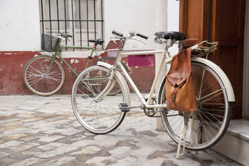 Fototapeta na wymiar Bikes in Street in the Santa Cruz Neighbourhood of Seville