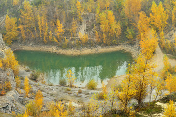 mountain lake among the autumn trees