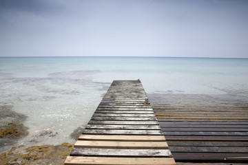 Fototapeta premium Pier and Jetty, Valencians Beach; Formentera