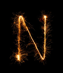 Sparkler firework light alphabet N (Capital Letters) at night