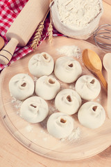 Baking ingredients for cooking manti dumplings.
