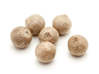 Macro closeup of a Organic White Pepper (Piper nigrum) isolated on white background.