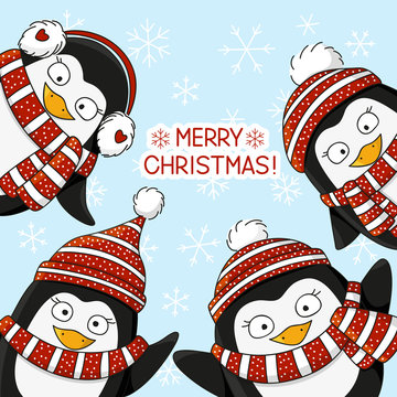 Cute penguins on snow background 