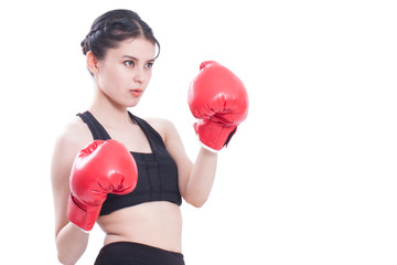 Boxer - portrait of fitness woman boxing wearing boxing gloves on white background.
