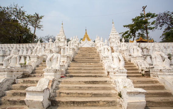 Staircase with white statues in Mingun, Mandalay