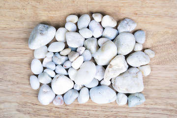 Clean white pebbles closeup like background.