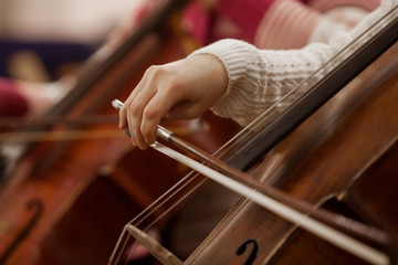  Hand girl playing cello closeup © furtseff