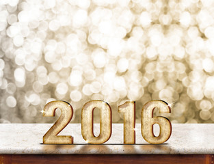 2016 year wood texture on marble table with gold sparkling bokeh