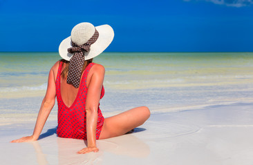 Fototapeta na wymiar young woman relax on summer beach