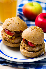 burger with pork  and apple.