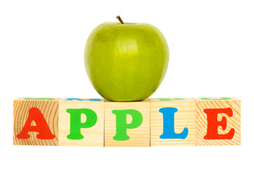 Wood cube with inscription APPLE 