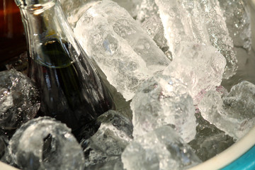 Cola with ice cubes