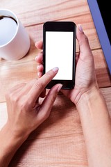 Businesswoman holding smartphone