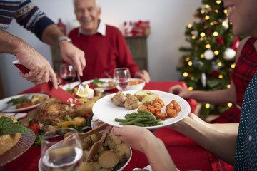 Head of the family cutting the turkey