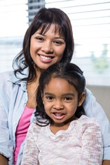 Portrait of happy mother with her daughter