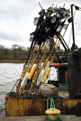 Fishing equipment net and makers. Cutter after fishing by dark, stormy day.