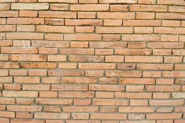 Brown brick wall in an old contemporary temple in Thailand