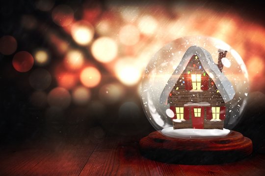 Christmas house in snow globe