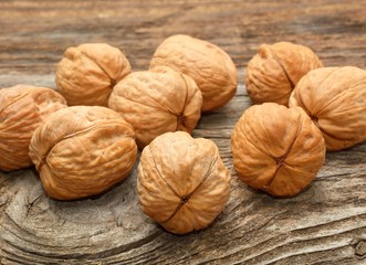 walnuts on wooden background