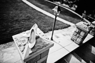 Wedding shoes on green grass