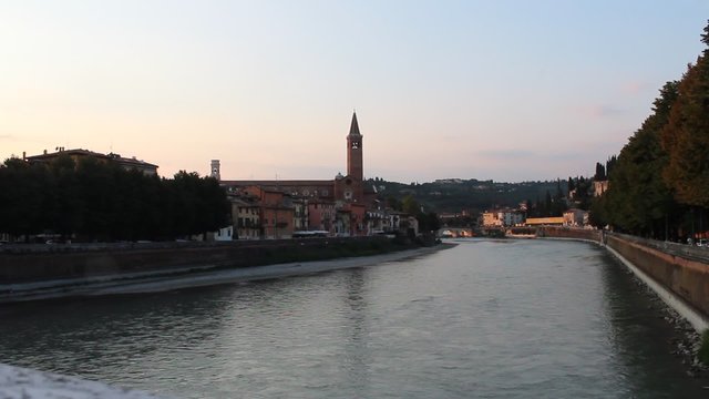 Verona city view in the evening.Fiume Adige river. Torre dei Lamberti tower