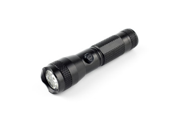 black metallic flashlight,isolated background