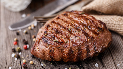 Beef steak on a wooden board