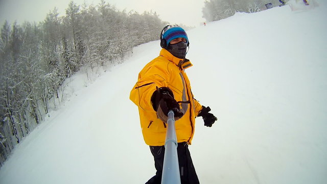 Male speed snowboarder snow 