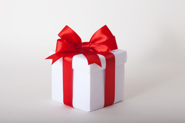 Gift box with ribbon and bow. Present.