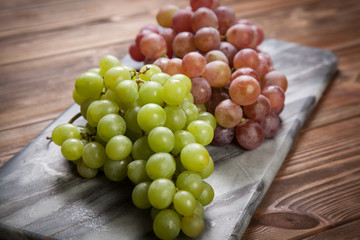 Delicious grapes on a kitchen table