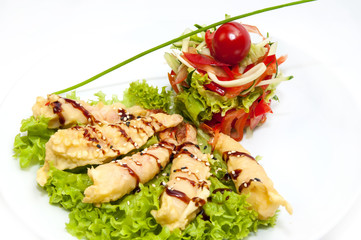 Deep fried shrimp and vegetable salad on white background
