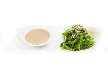 salad with exotic marine algae on a white background
