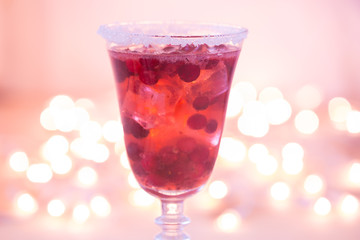Glass of champagne and cranberry cocktail. Close up