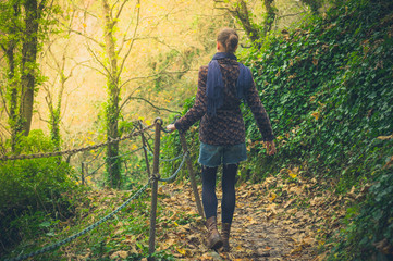 Young woman walking in forest