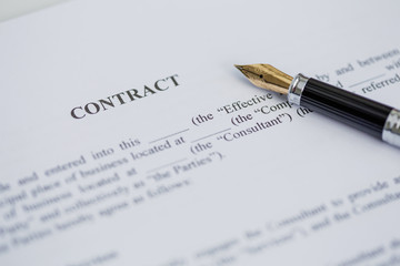 Contract and pen 