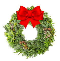 Fototapeta na wymiar Christmas wreath from fir, pine and spruce red ribbon bow